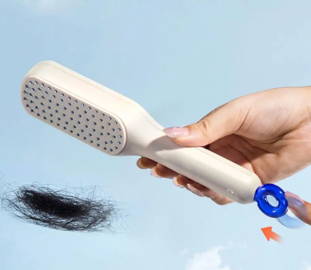 Brosse à cheveux autonettoyante