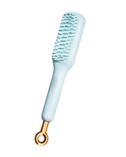 Brosse à cheveux autonettoyante
